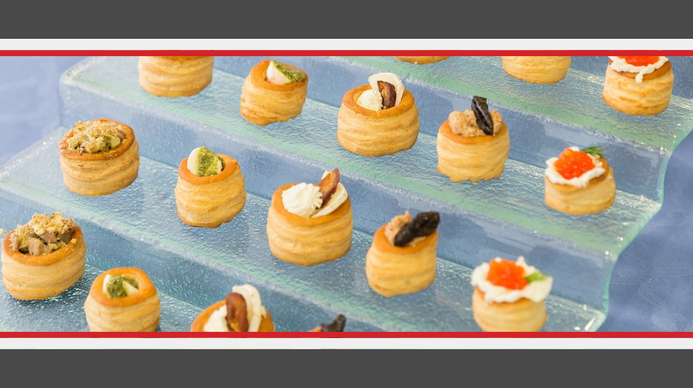 Canapes placed on a stair-like decorative stand