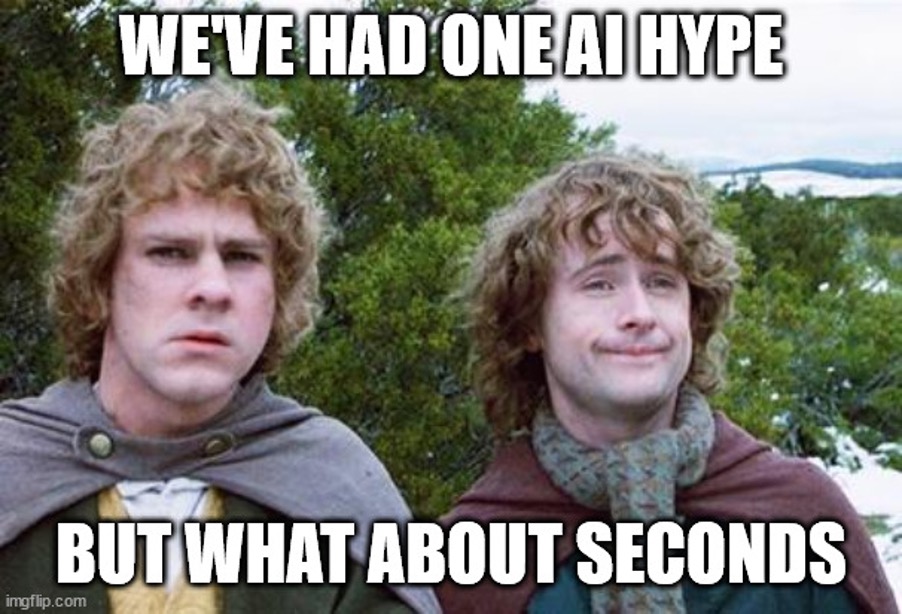 Two hobbits staring ahead, a caption in bold white letters reads We've had one AI hype, but what about seconds