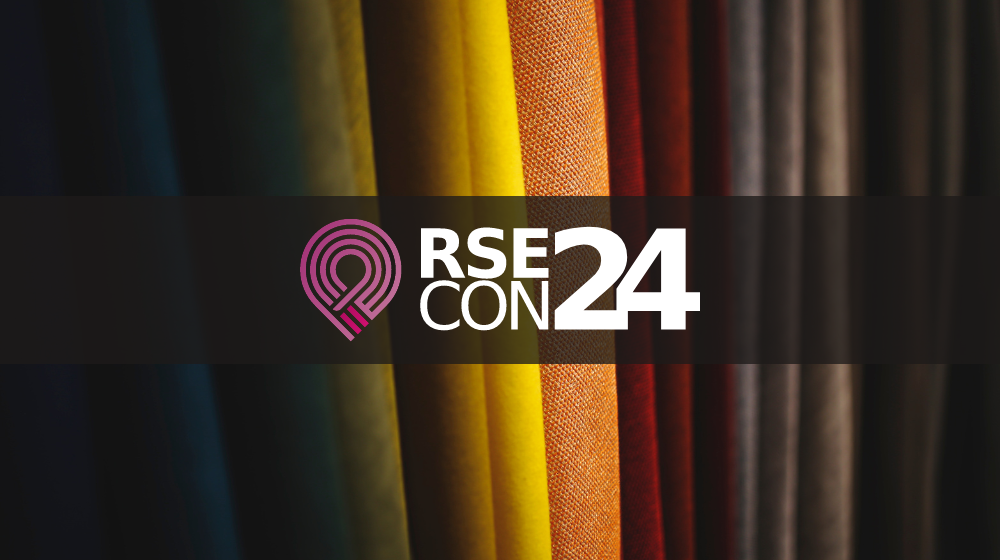 RSECon24 logo, colourful fabric in the background