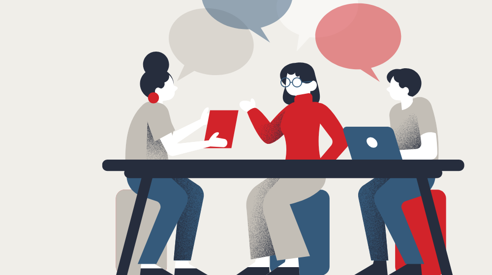 People speaking around a table