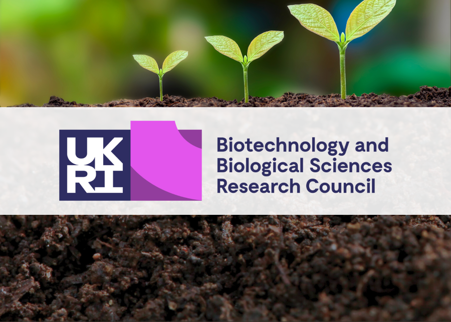 BBSRC logo against a background of soil and growing plants