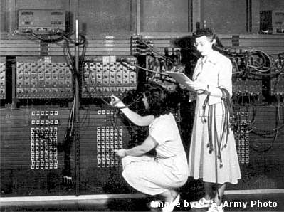 In this image: Two women wiring the right side of the ENIAC with a new program, in the "pre- von Neumann" days. "U.S. Army Photo" from the archives of the ARL Technical Library. Standing: Marlyn Wescoff Crouching: Ruth Lichterman 