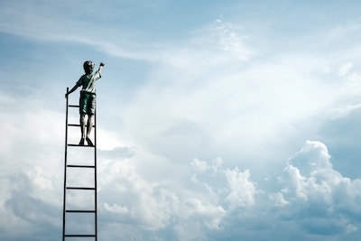 Human reaching for the sky