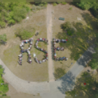 Image of people spelling out RSE taken from above